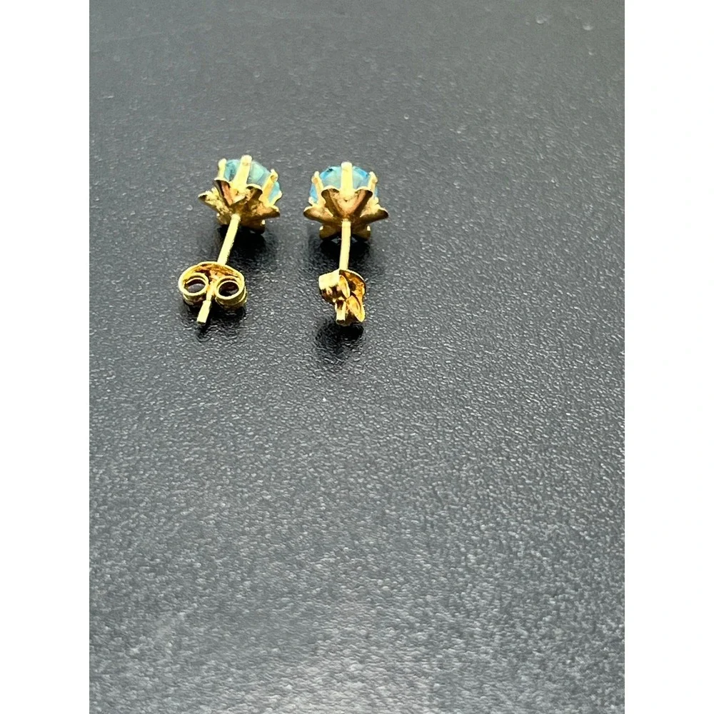 JCM Jacmel Round 5mm Prong‎ Set Blue CZ 14K Yellow Gold March Stud Earring